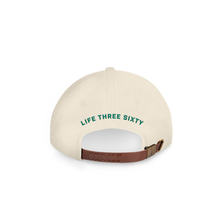 Back of the hat with Life Three Sixty written across it in green and a brown leather adjustable strap