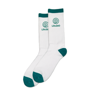 Track Star socks sitting on the other side showing the life360 logo in green